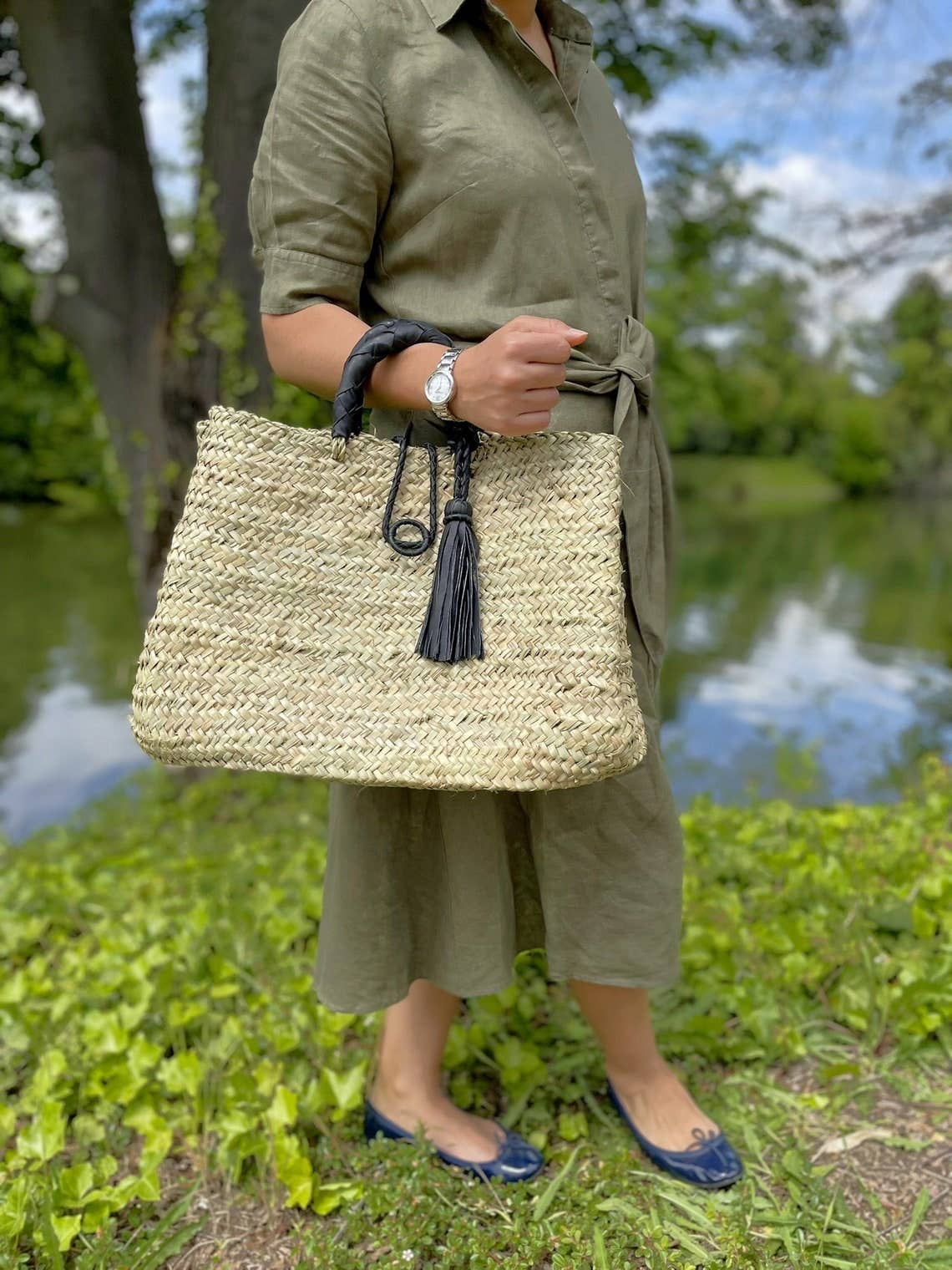 Bag with braided handles in leather
