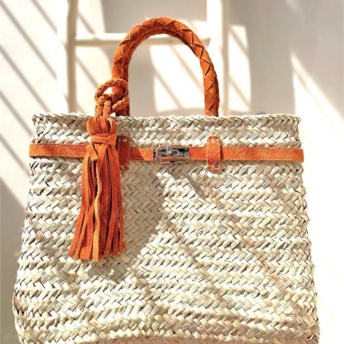 Palm bag with leather straps, offered in two sizes: S and M